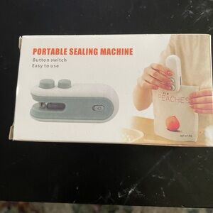 PORTABLE SEALING MACHINE